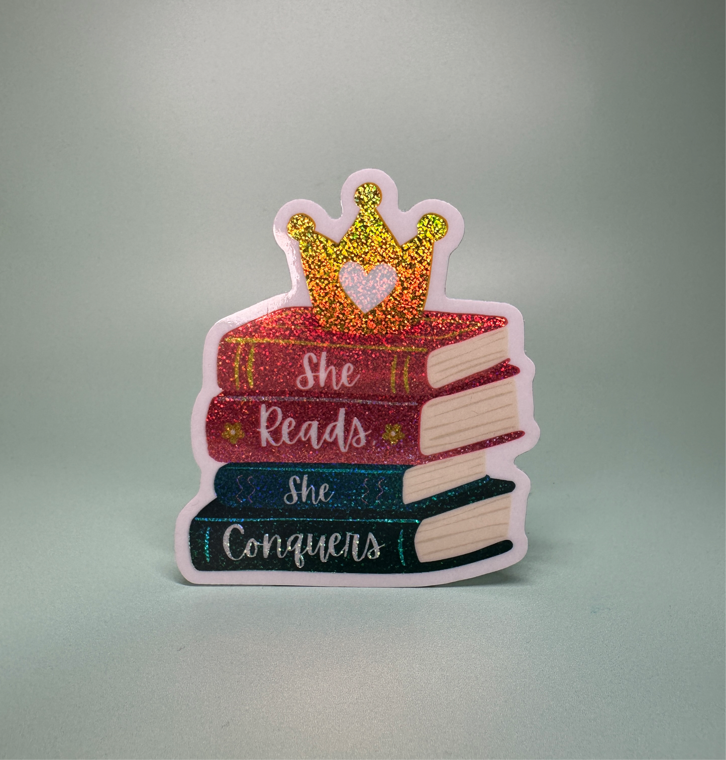 She Reads, She Conquers - Glitter Sticker